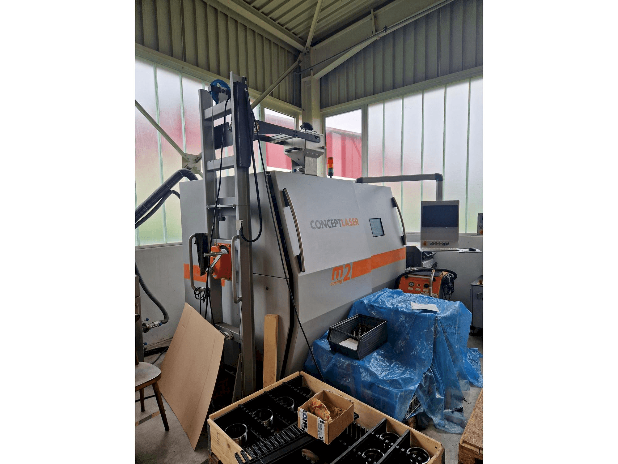 Vue de face de la machine CONCEPT LASER M2 cusing