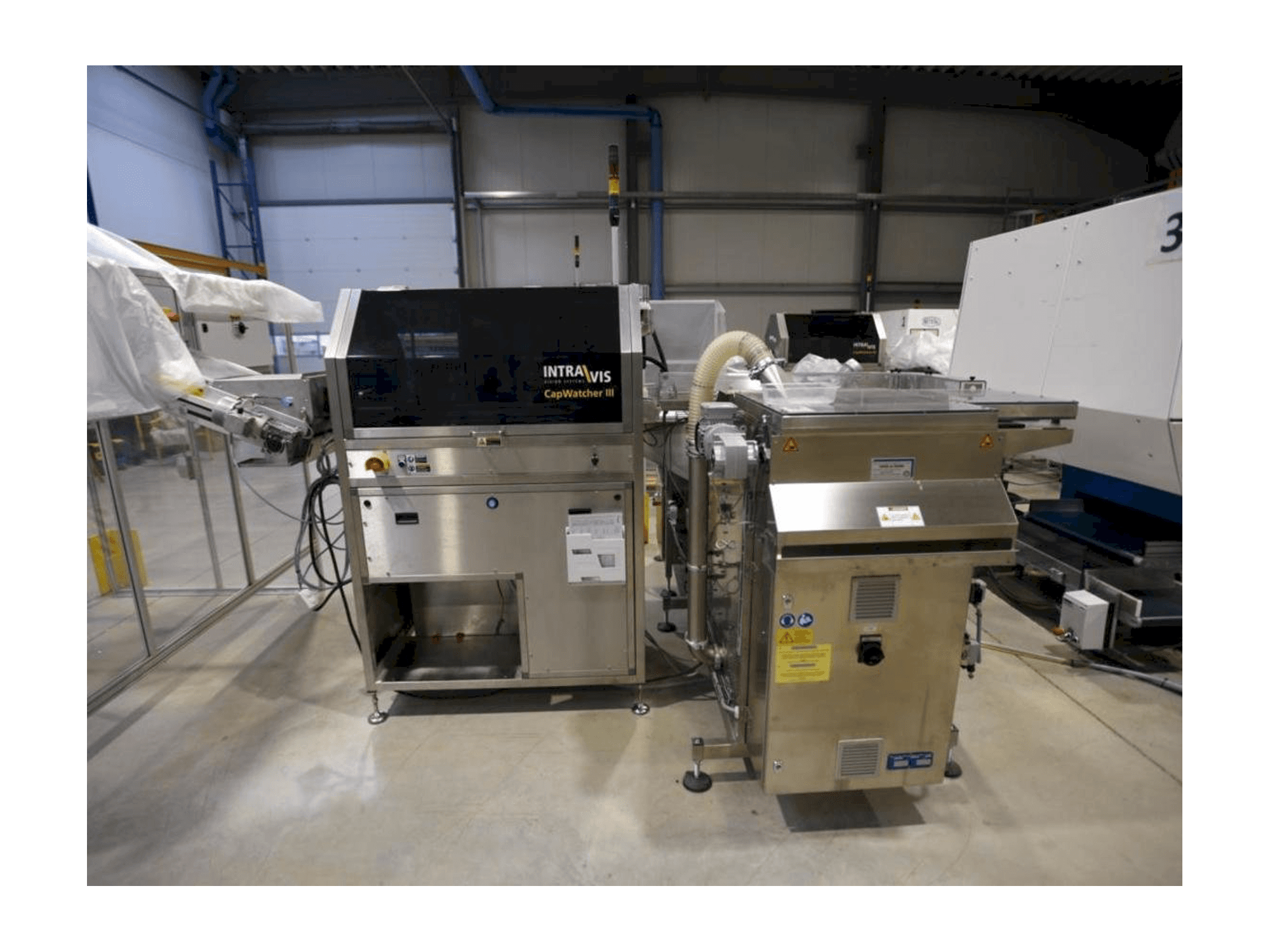 Vue de face de la machine INTRAVIS Capwatcher 6431