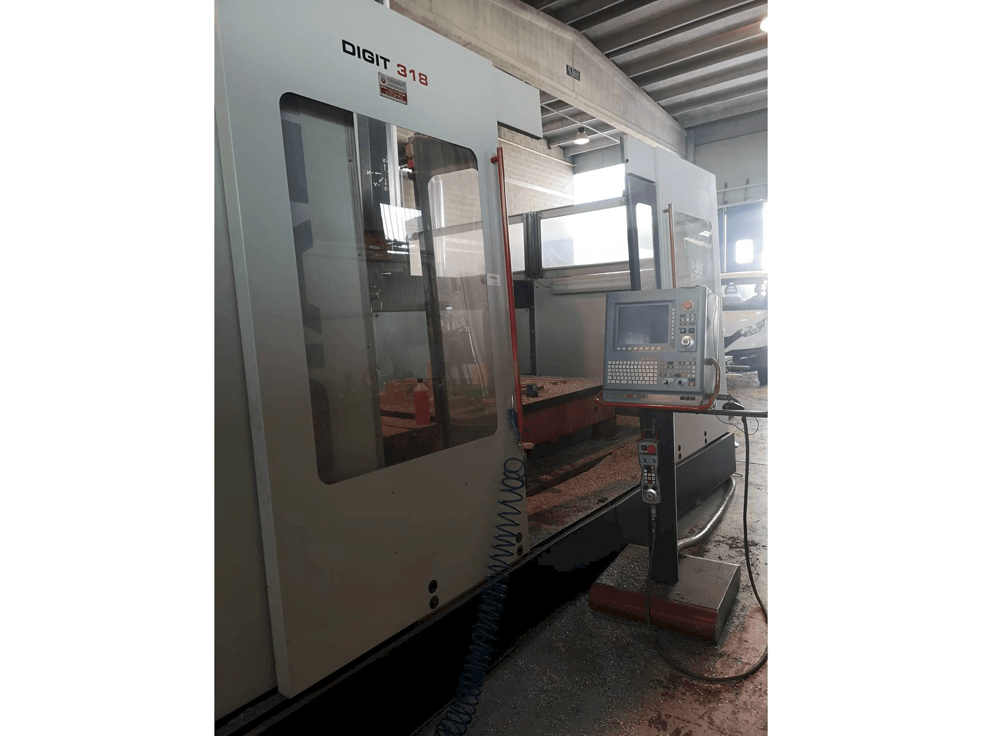 Vue latérale gauche de la machine Fidia DIGIT 318 FH