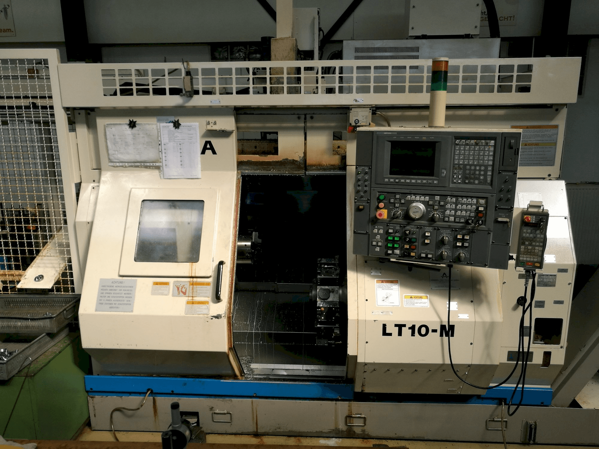 Front view of Okuma LT10-M machine